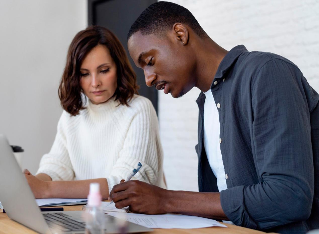 Founder reviewing financial documentation and business metrics